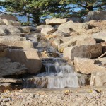 Natural looking water feature and waterfall in Lethbridge Alberta