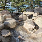Natural looking water feature and waterfall in Lethbridge Alberta